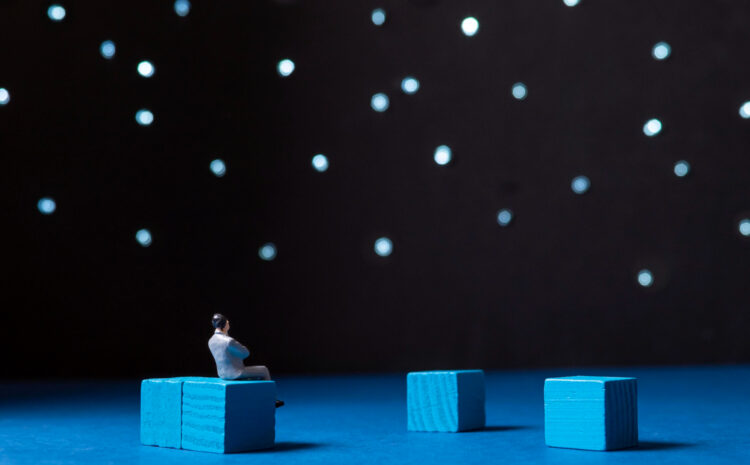 Miniature figure contemplating under a starry sky, symbolizing financial decision-making under uncertainty, with blue blocks representing potential strategies and outcomes in "What If" scenario planning.